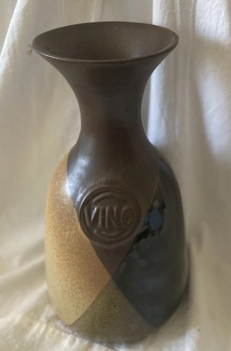Hand thrown ceramic wine - hand,