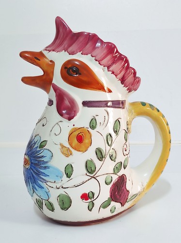 Brocca ceramica a forma - a,